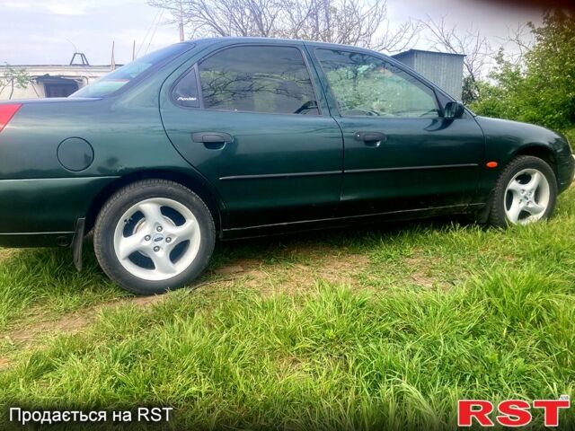 Зеленый Форд Мондео, объемом двигателя 1.8 л и пробегом 430 тыс. км за 3000 $, фото 7 на Automoto.ua