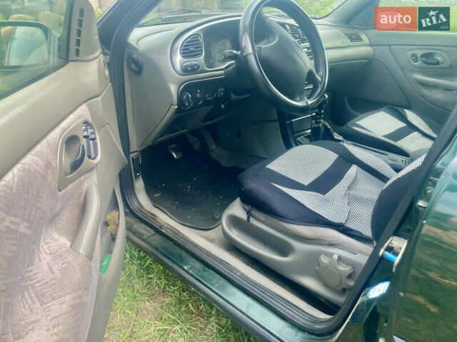 Зеленый Форд Мондео, объемом двигателя 1.8 л и пробегом 440 тыс. км за 3000 $, фото 2 на Automoto.ua