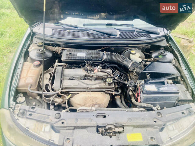 Зеленый Форд Мондео, объемом двигателя 1.8 л и пробегом 440 тыс. км за 3000 $, фото 7 на Automoto.ua