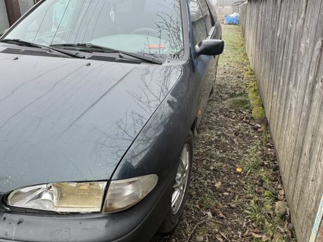 Зеленый Форд Мондео, объемом двигателя 2 л и пробегом 335 тыс. км за 900 $, фото 1 на Automoto.ua