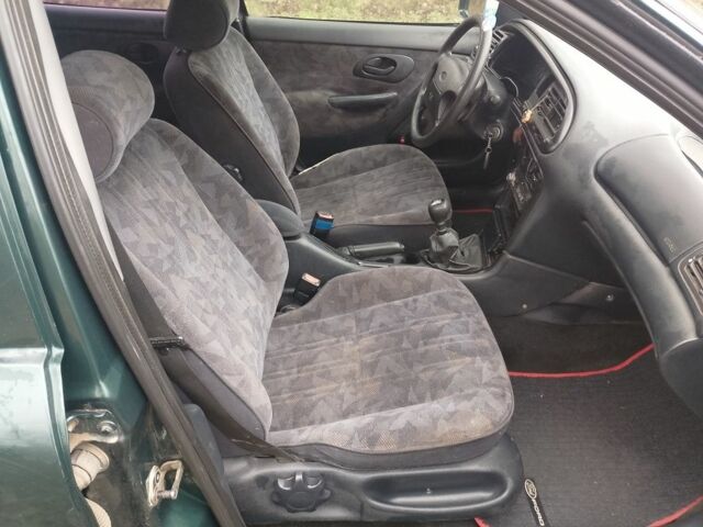 Зеленый Форд Мондео, объемом двигателя 1.8 л и пробегом 350 тыс. км за 985 $, фото 9 на Automoto.ua