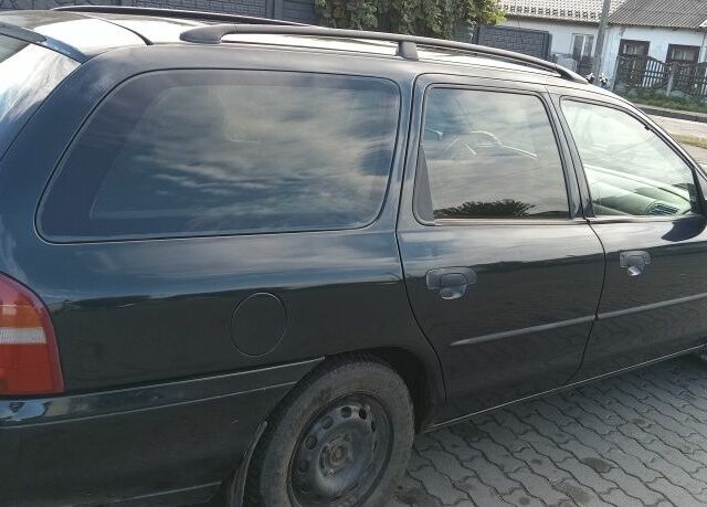 Зелений Форд Мондео, об'ємом двигуна 1.8 л та пробігом 284 тис. км за 1750 $, фото 9 на Automoto.ua