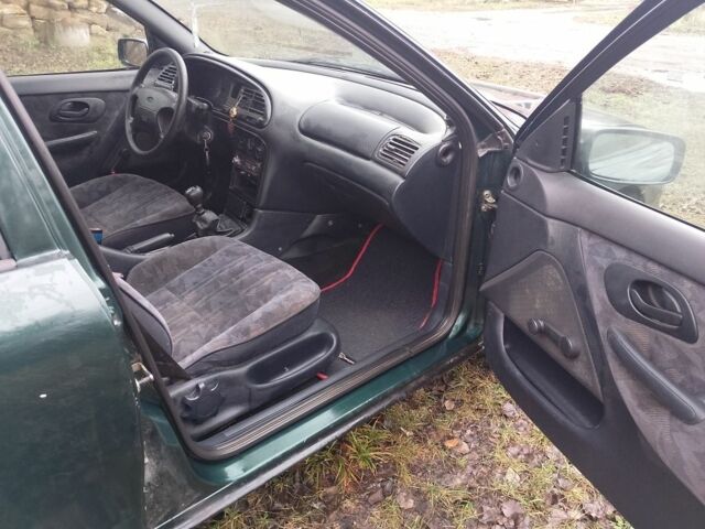 Зеленый Форд Мондео, объемом двигателя 1.8 л и пробегом 350 тыс. км за 985 $, фото 11 на Automoto.ua