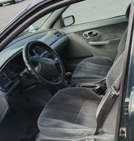 Зелений Форд Мондео, об'ємом двигуна 1.8 л та пробігом 284 тис. км за 1750 $, фото 8 на Automoto.ua