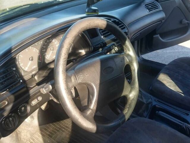 Зелений Форд Мондео, об'ємом двигуна 1.8 л та пробігом 325 тис. км за 2330 $, фото 21 на Automoto.ua