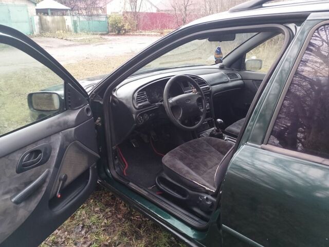 Зеленый Форд Мондео, объемом двигателя 1.8 л и пробегом 350 тыс. км за 985 $, фото 10 на Automoto.ua