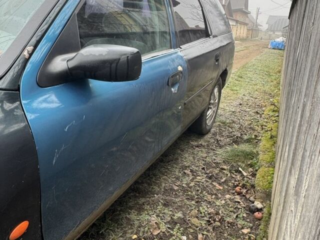 Зеленый Форд Мондео, объемом двигателя 2 л и пробегом 335 тыс. км за 900 $, фото 3 на Automoto.ua