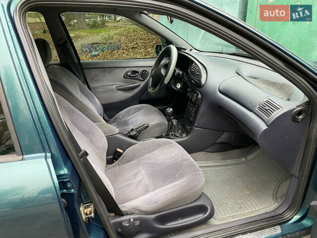 Зеленый Форд Мондео, объемом двигателя 1.8 л и пробегом 294 тыс. км за 2200 $, фото 13 на Automoto.ua