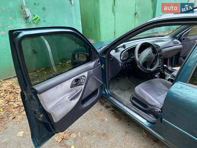 Зеленый Форд Мондео, объемом двигателя 1.8 л и пробегом 294 тыс. км за 2200 $, фото 12 на Automoto.ua