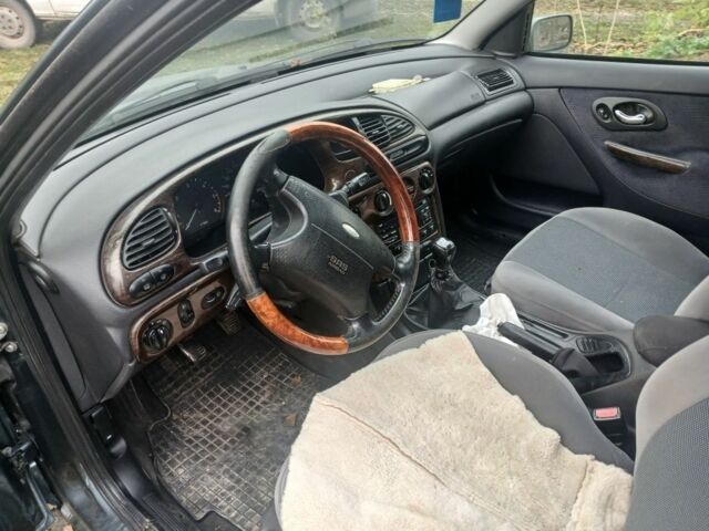 Зелений Форд Мондео, об'ємом двигуна 1.8 л та пробігом 300 тис. км за 2100 $, фото 4 на Automoto.ua