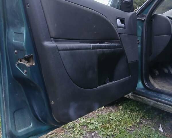 Зеленый Форд Мондео, объемом двигателя 2 л и пробегом 348 тыс. км за 2500 $, фото 4 на Automoto.ua