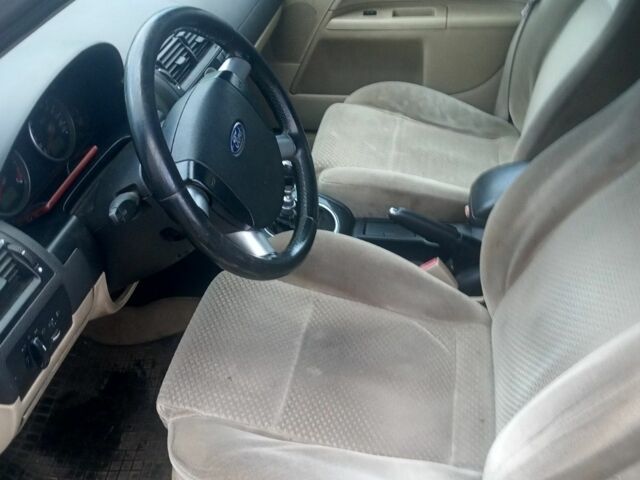 Оранжевый Форд Мондео, объемом двигателя 2 л и пробегом 320 тыс. км за 550 $, фото 6 на Automoto.ua