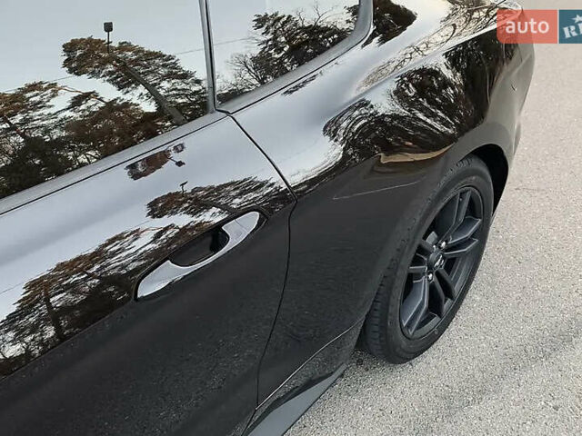 Черный Форд Мустанг, объемом двигателя 2.26 л и пробегом 180 тыс. км за 12000 $, фото 10 на Automoto.ua