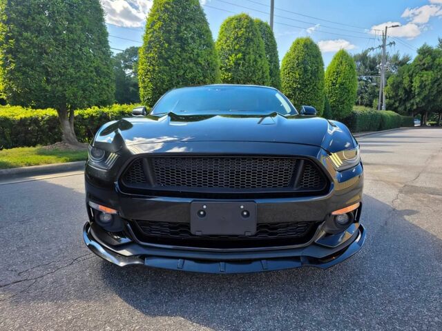 Чорний Форд Мустанг, об'ємом двигуна 2.3 л та пробігом 61 тис. км за 8900 $, фото 1 на Automoto.ua