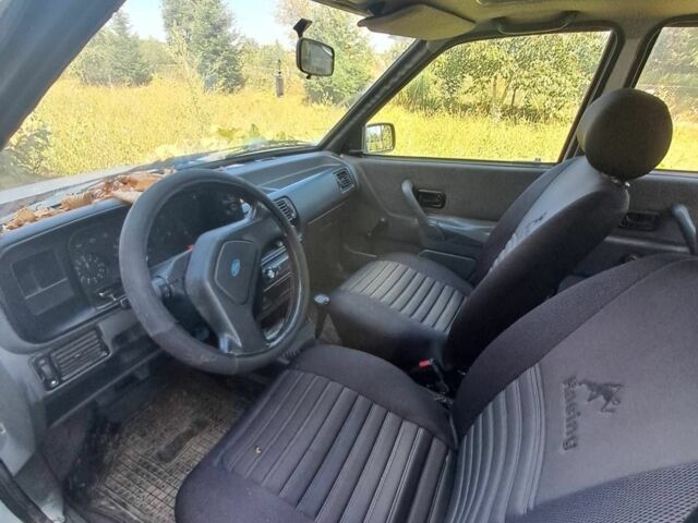 Білий Форд Оріон, об'ємом двигуна 1.4 л та пробігом 250 тис. км за 700 $, фото 2 на Automoto.ua