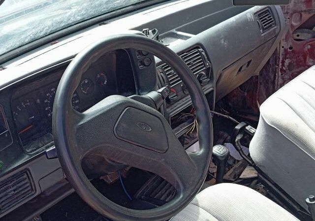 Красный Форд Орион, объемом двигателя 0.14 л и пробегом 500 тыс. км за 450 $, фото 5 на Automoto.ua