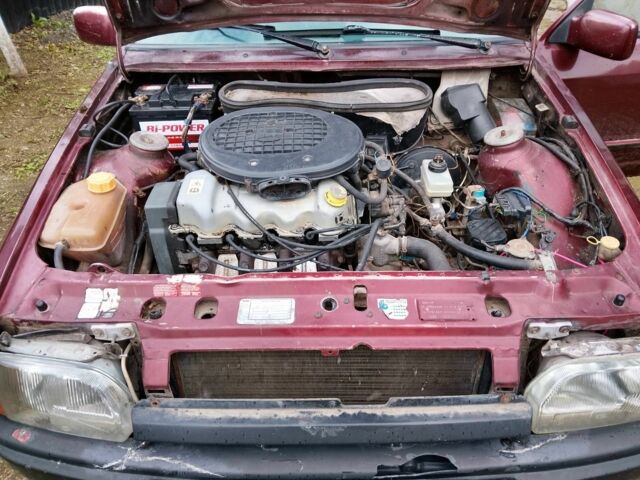 Красный Форд Орион, объемом двигателя 2 л и пробегом 300 тыс. км за 600 $, фото 6 на Automoto.ua