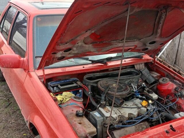 Красный Форд Орион, объемом двигателя 1.4 л и пробегом 111 тыс. км за 600 $, фото 2 на Automoto.ua