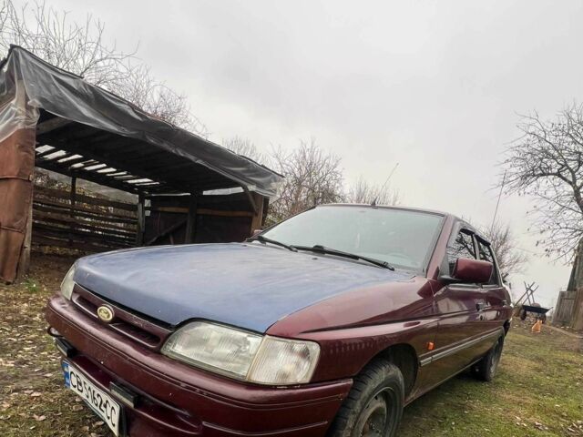 Красный Форд Орион, объемом двигателя 1.6 л и пробегом 97 тыс. км за 714 $, фото 3 на Automoto.ua