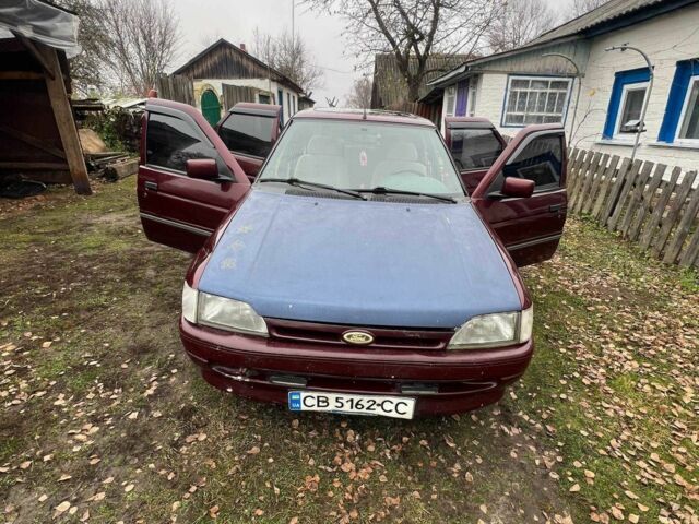 Красный Форд Орион, объемом двигателя 1.6 л и пробегом 97 тыс. км за 714 $, фото 4 на Automoto.ua