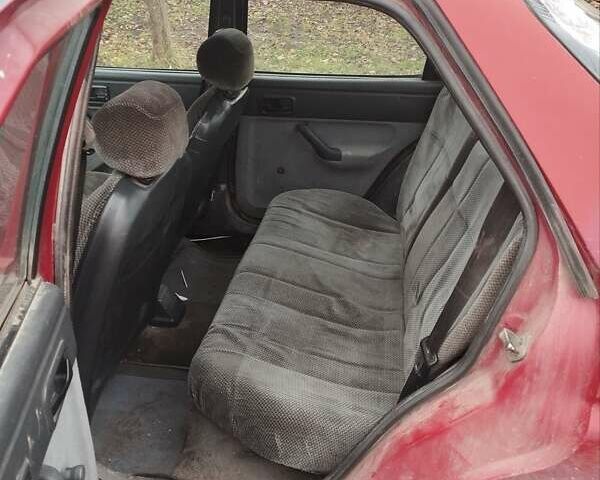 Красный Форд Орион, объемом двигателя 1.6 л и пробегом 140 тыс. км за 350 $, фото 5 на Automoto.ua