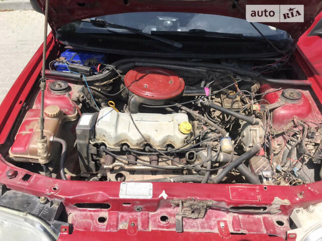 Красный Форд Орион, объемом двигателя 1.4 л и пробегом 200 тыс. км за 1450 $, фото 25 на Automoto.ua