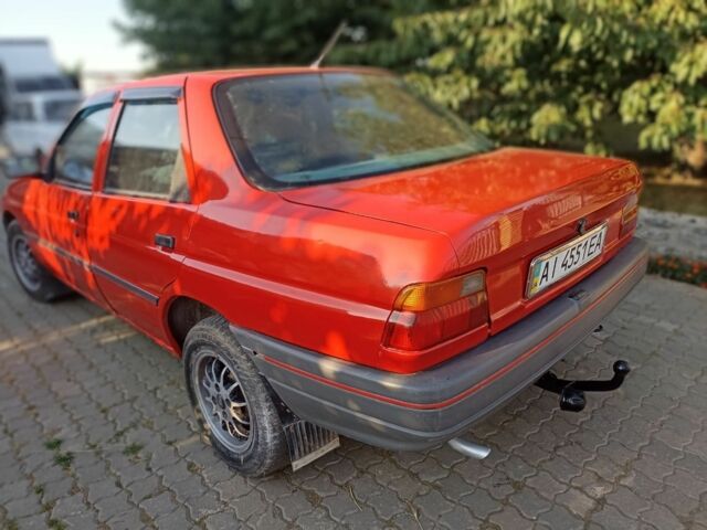 Красный Форд Орион, объемом двигателя 1.4 л и пробегом 341 тыс. км за 1000 $, фото 4 на Automoto.ua