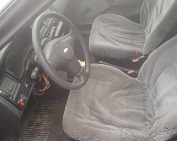 Красный Форд Орион, объемом двигателя 1.4 л и пробегом 365 тыс. км за 500 $, фото 2 на Automoto.ua