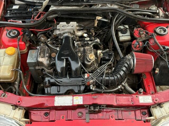 Красный Форд Орион, объемом двигателя 0.16 л и пробегом 300 тыс. км за 1100 $, фото 7 на Automoto.ua
