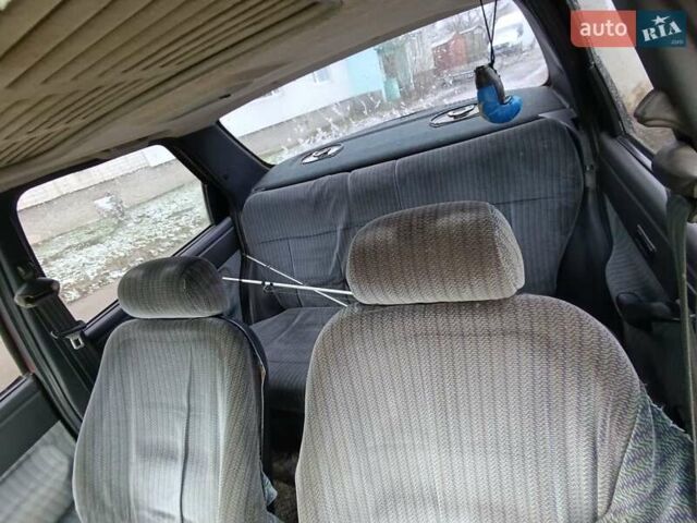 Красный Форд Орион, объемом двигателя 2 л и пробегом 186 тыс. км за 599 $, фото 6 на Automoto.ua