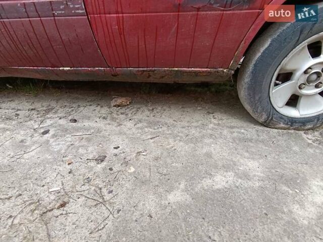 Красный Форд Орион, объемом двигателя 2 л и пробегом 186 тыс. км за 599 $, фото 4 на Automoto.ua