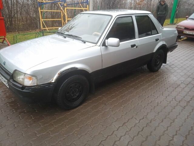 Серый Форд Орион, объемом двигателя 0 л и пробегом 200 тыс. км за 450 $, фото 1 на Automoto.ua