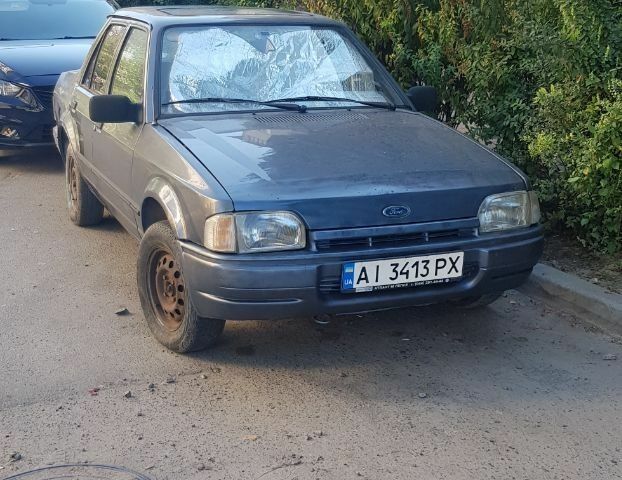 Серый Форд Орион, объемом двигателя 1.3 л и пробегом 300 тыс. км за 700 $, фото 1 на Automoto.ua