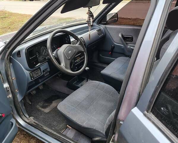 Форд Орион 1988 в Сумах на Automoto.ua Серый Форд Орион, объемом двигателя 1.4 л и пробегом 96 тыс. км за 2600 $, фото 7 на Automoto.ua