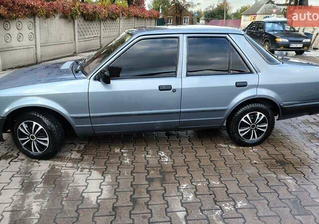 Форд Орион 1988 в Сумах на Automoto.ua Серый Форд Орион, объемом двигателя 1.4 л и пробегом 96 тыс. км за 2600 $, фото 8 на Automoto.ua