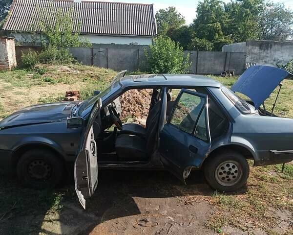 Серый Форд Орион, объемом двигателя 0 л и пробегом 100 тыс. км за 472 $, фото 4 на Automoto.ua