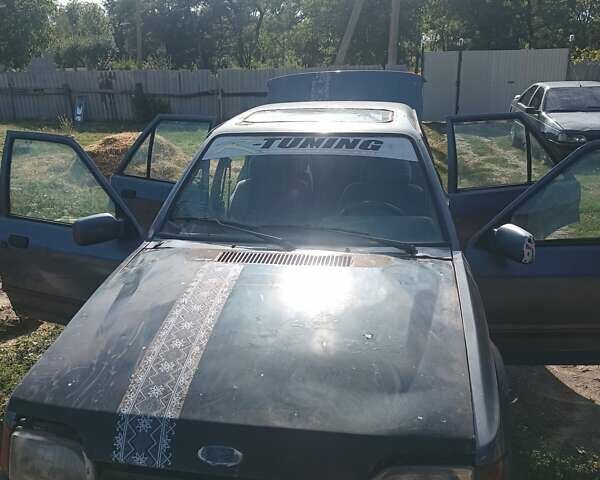 Серый Форд Орион, объемом двигателя 0 л и пробегом 100 тыс. км за 472 $, фото 5 на Automoto.ua