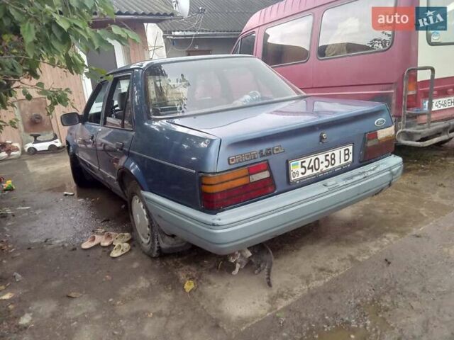 Синий Форд Орион, объемом двигателя 1.4 л и пробегом 280 тыс. км за 550 $, фото 8 на Automoto.ua