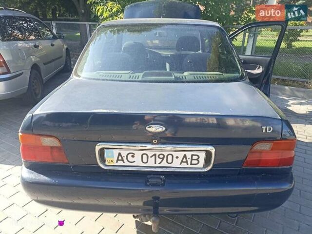 Синий Форд Орион, объемом двигателя 1.8 л и пробегом 392 тыс. км за 1000 $, фото 1 на Automoto.ua