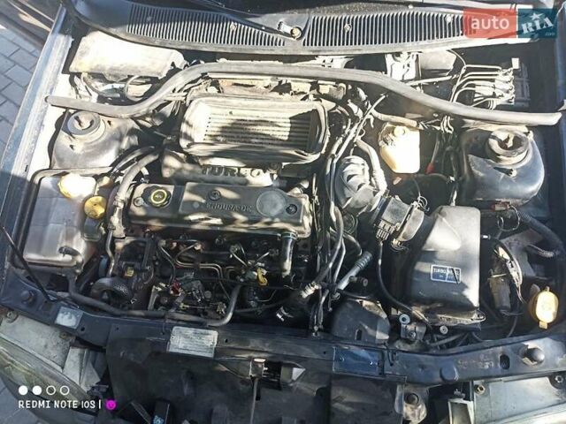 Синий Форд Орион, объемом двигателя 1.8 л и пробегом 392 тыс. км за 850 $, фото 4 на Automoto.ua