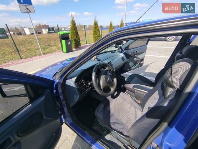 Синій Форд Оріон, об'ємом двигуна 1.6 л та пробігом 200 тис. км за 1200 $, фото 10 на Automoto.ua