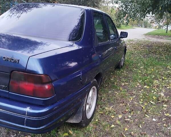 Синий Форд Орион, объемом двигателя 1.6 л и пробегом 200 тыс. км за 1249 $, фото 5 на Automoto.ua