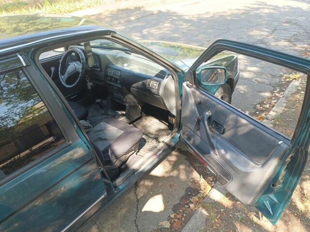 Зеленый Форд Орион, объемом двигателя 1.6 л и пробегом 120 тыс. км за 1299 $, фото 7 на Automoto.ua