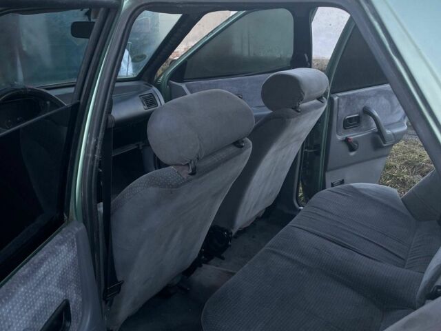 Зеленый Форд Орион, объемом двигателя 1.4 л и пробегом 97 тыс. км за 400 $, фото 1 на Automoto.ua