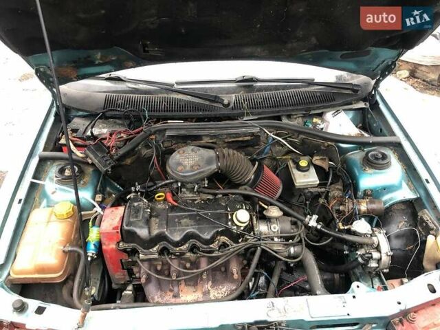 Зеленый Форд Орион, объемом двигателя 1.3 л и пробегом 280 тыс. км за 500 $, фото 4 на Automoto.ua