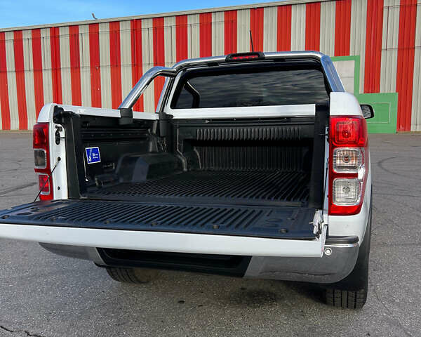 Белый Форд Рейнджер, объемом двигателя 2 л и пробегом 165 тыс. км за 32000 $, фото 6 на Automoto.ua