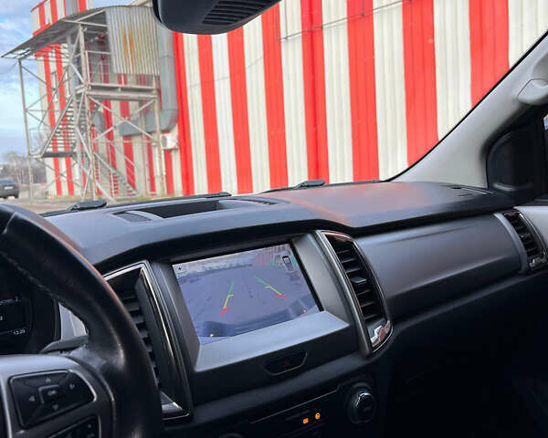 Белый Форд Рейнджер, объемом двигателя 2 л и пробегом 165 тыс. км за 32000 $, фото 19 на Automoto.ua