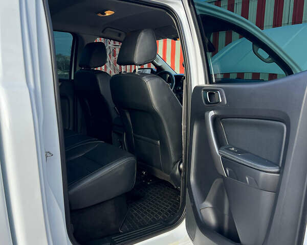 Белый Форд Рейнджер, объемом двигателя 2 л и пробегом 165 тыс. км за 32000 $, фото 14 на Automoto.ua