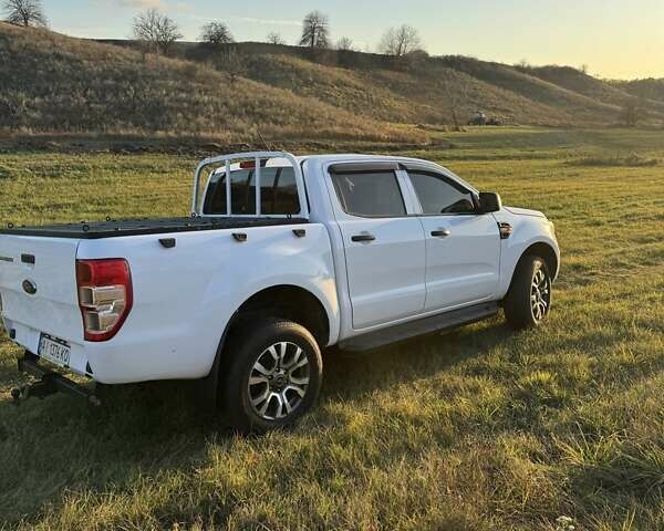 Білий Форд Рейнджер, об'ємом двигуна 2 л та пробігом 217 тис. км за 23000 $, фото 2 на Automoto.ua