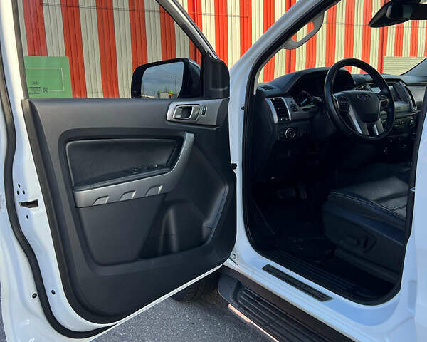 Белый Форд Рейнджер, объемом двигателя 2 л и пробегом 165 тыс. км за 32000 $, фото 13 на Automoto.ua